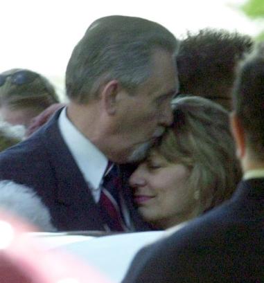 Brazelton hugs Sharon