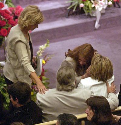 Speakers greet Sharon.